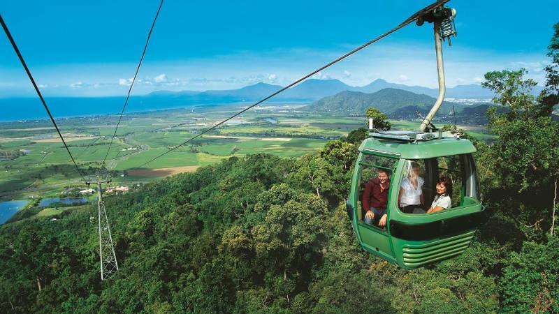Visit the beautiful Kuranda village in the rainforest via Skyrail Cableway and Kuranda Scenic Railway from Cairns. Take a late departure and early return option to get 1.5 - 2hr free time Kuranda.